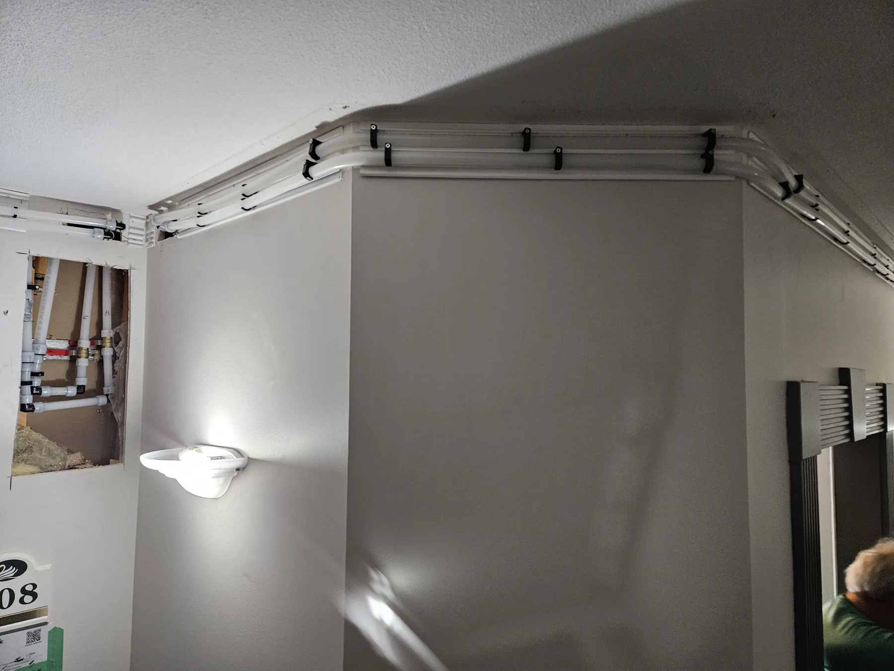 Planned Plumbing Track route visible during installation