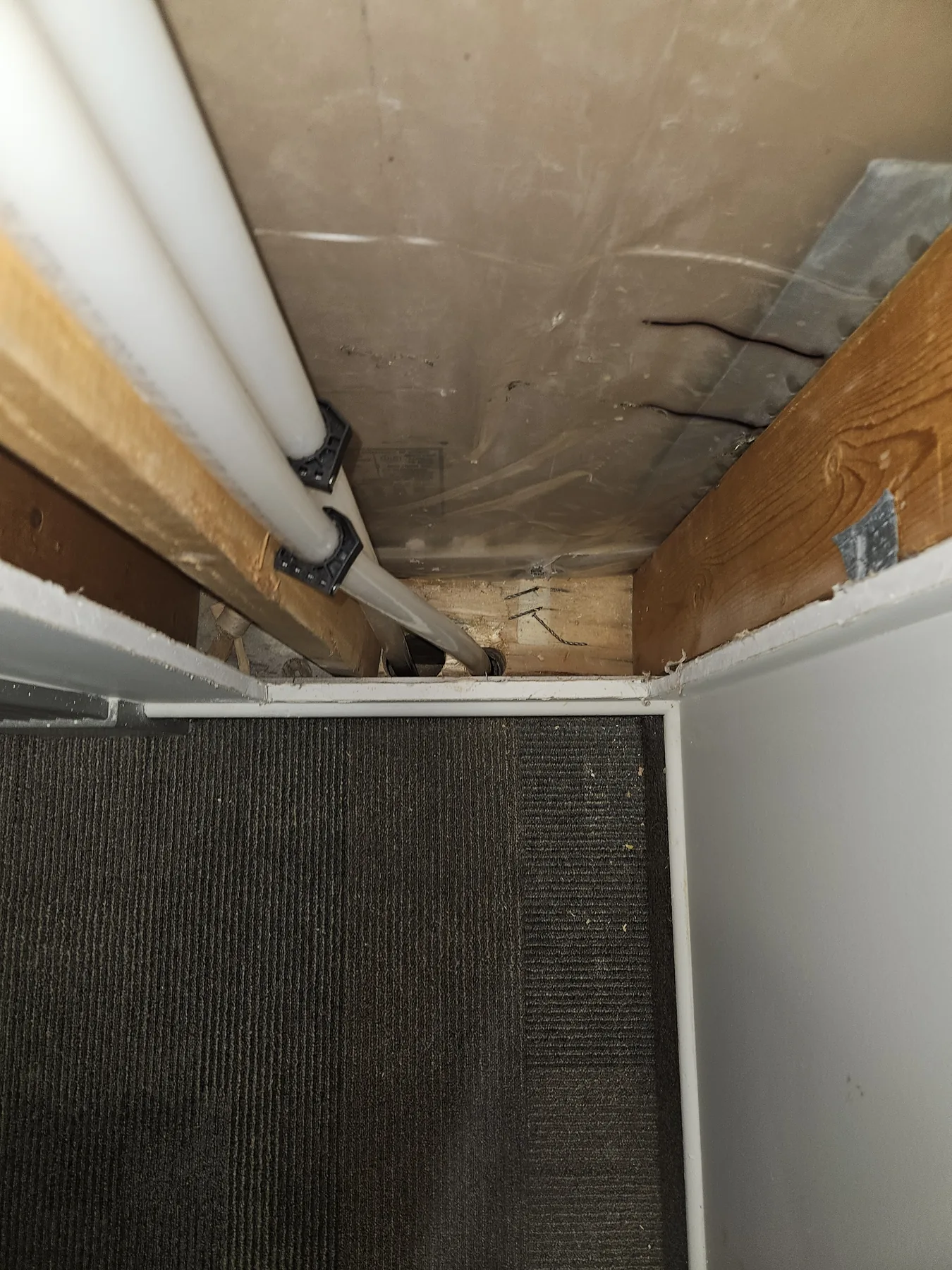 New plumbing installed through a concentrated access opening
