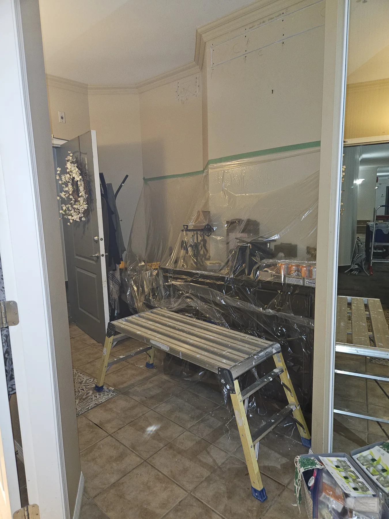 Plumbing Track work underway in a protected occupied kitchen