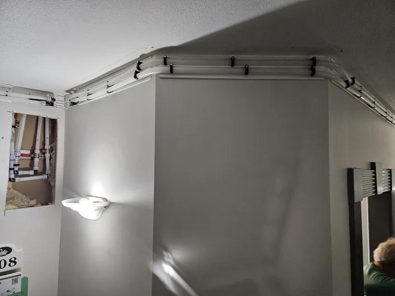 Planned Plumbing Track route visible during installation